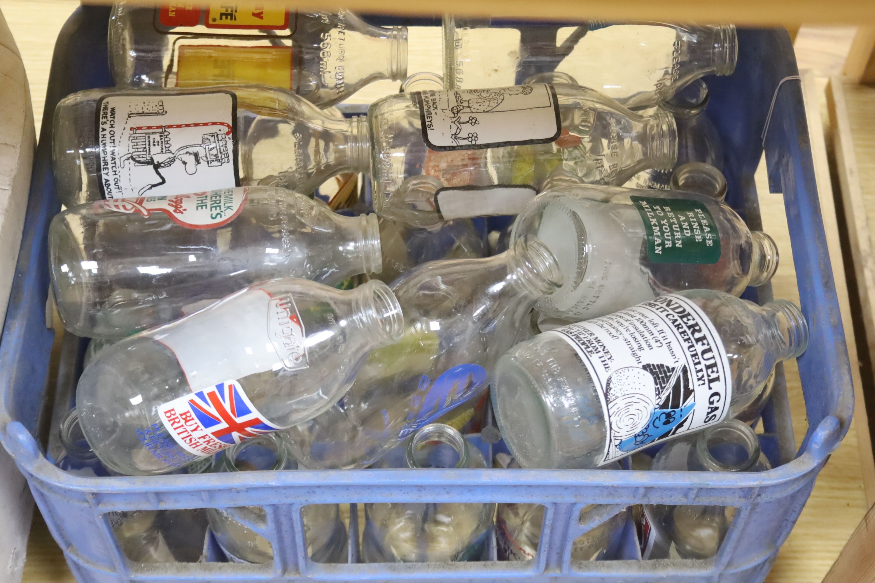 A large collection of branded milk bottles 1970s or later